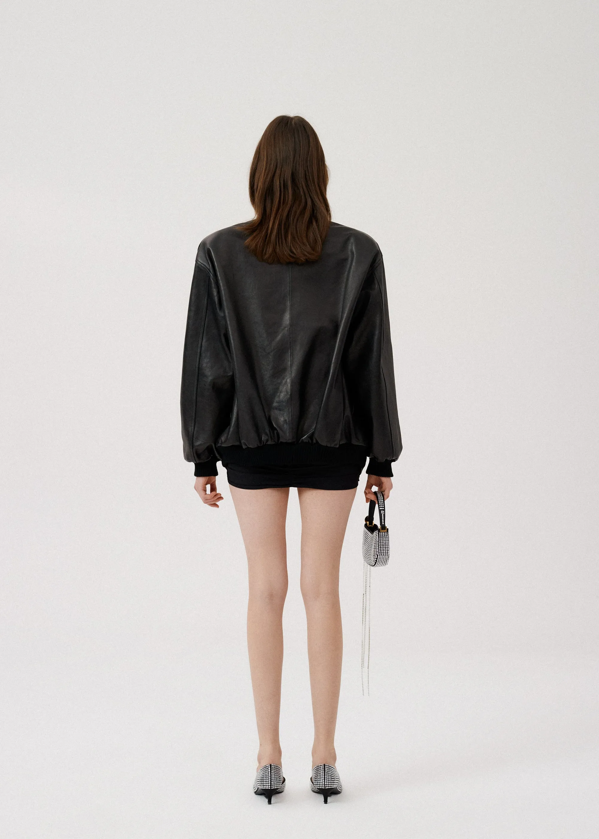 Oversized leather bomber jacket in black